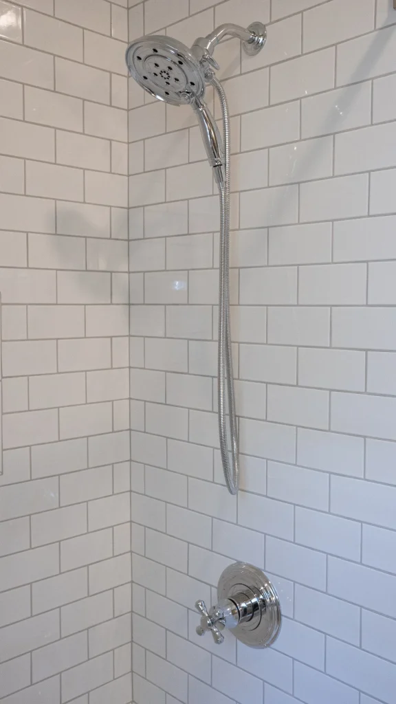 Asheville bathroom remodel by The Hands of Sean Perry - shower tiles and new fixtures