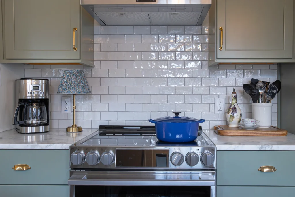 Kitchen remodel contractor Asheville: stove, cabinets and backsplash