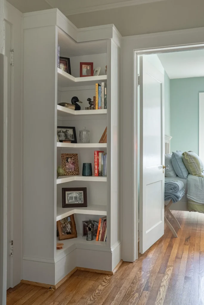 Custom corner built-in bookshelves - Asheville home renovation