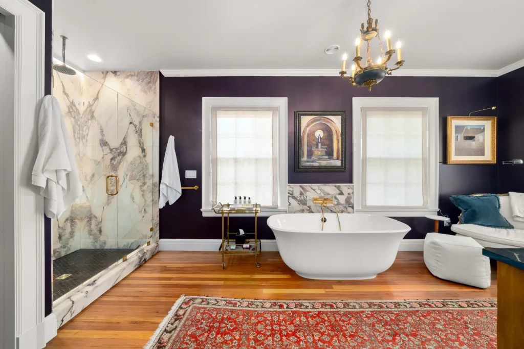 en suite bathroom remodel with custom vanity and tub