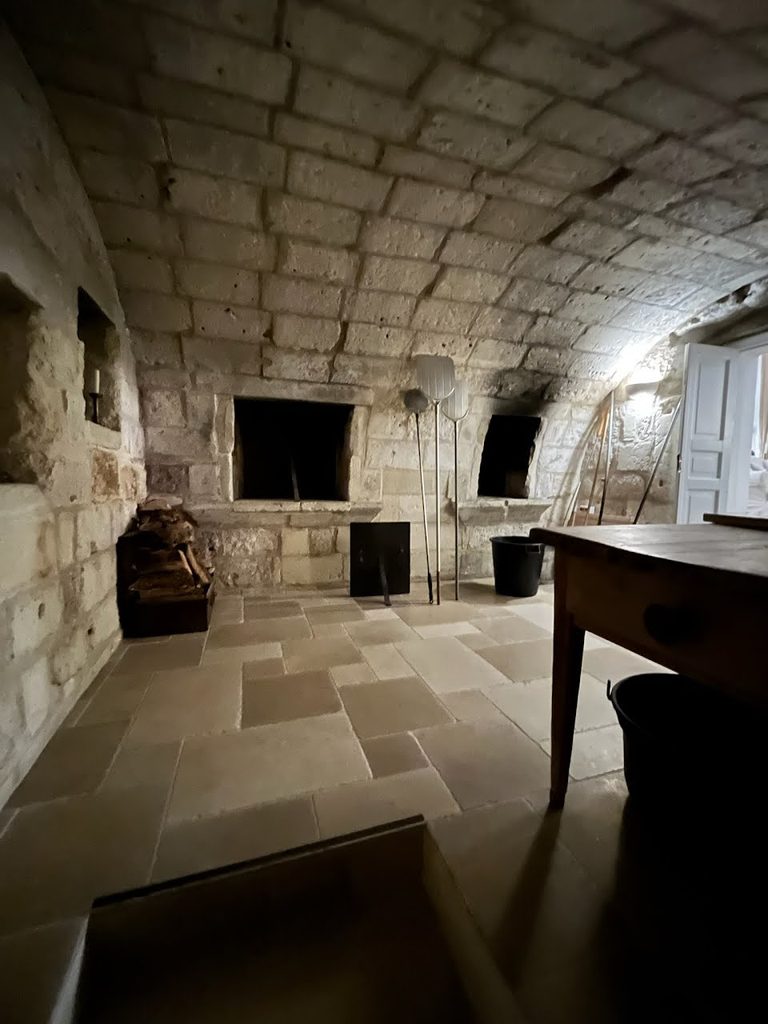 Original ancient pizza room with stone salt ovens in Palazzo Ducale Venturi.