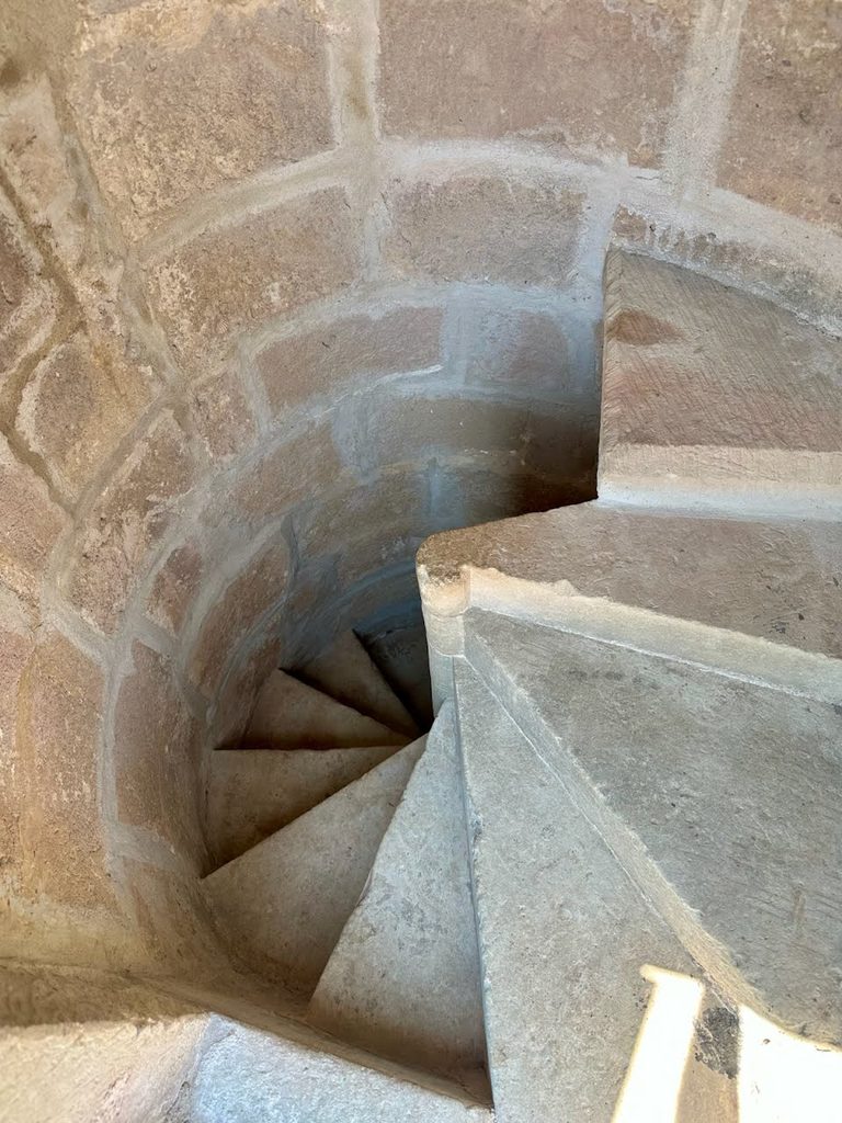 A secret stairwell leading from the Duke's personal chambers to the roof at Palazzo Ducale Venturi.